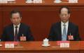 2025年3月11日，在中共全国人民代表大会闭幕式现场。图为时任中组部长李干杰（左）和时任统战部部长石泰峰（右）。
