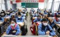 2020年3月30日，江苏省淮安市COVID-19病毒疫情期间，初中和高三学生返回教室。示意图(图片来源：STRAFP via Getty Images)