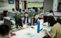 2016年9月13日，上海税务局的工作人员正在办公。（图片来源：FRED DUFOUR/AFP via Getty Images）