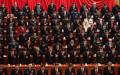 2022年10月16日，在北京人民大会堂举行的中共第二十次全国代表大会开幕式上，中共与会官员为已故中共毛党魁泽东默哀一分钟并低头致哀。（图片来源：Kevin Frayer/Getty Images）