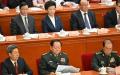 2025年3月4日，中共中央政法委书记陈文清（左）、时任中共中央军委副主席何卫东（右）和时任军委副主席张又侠（中）在北京人民大会堂出席中共政协会议开幕式。（图片来源：ADEK BERRY/AFP via Getty Images）