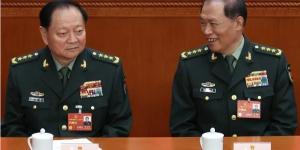 2023年3月12日,中共中央军委副主席张又侠与时任军委副主席何卫东出席在北京人民大会堂召开的全国人大第五次全体会议。（图片来源：Lintao Zhang/Getty Images）