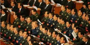 2007年10月21日，在北京人民大会堂举行中共第十七次中共党代会，图中是出席会议的中共军事代表们。(图片来源：FREDERIC J.BROWN/AFP via Getty Images)