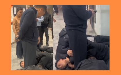 2月9日，甘肃甘南州多名农民工抱着老板的大腿讨薪。      (图片来源：视频截图)