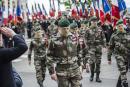 5月18日，法国于贝尔突击队队员在悼念牺牲战友的仪式前。(AFP/Getty Images)