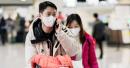 1月21日在北京大兴国际机场，头戴口罩的旅客。（AFP via Getty Images）