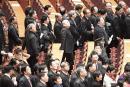 参加两会的官员（GREG BAKER/AFP/Getty Images） 