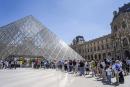 7月1日至9月8日，所有游客参观卢浮宫必须提前预约。（ANTOINE BOUREAU/Hans Lucas/AFP via Getty Images）