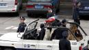 2005年4月17日，中国员警在广州天河体育场巡逻。(图片来源:STR/AFP via Getty Images)