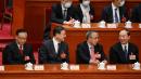 （从左到右）2023年3月12日，中共中央政治局委员张国庆、上海市委书记陈吉宁、全国政协副主席胡春华、广东省委书记黄坤明出席在北京人民大会堂举行的全国人民代表大会第五次全体会议。（图片来源：NOEL CELIS/AFP via Getty Images）