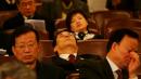 2007年3月5日，中共各代表团在出席全国人民代表大会开幕式时打瞌睡。（图片来源：Getty Images）