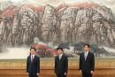 2017年10月25日，时任中共政治局常委韩正、王沪宁、栗战书出席在北京人民大会堂举行的媒体问候会。（图片来源：Lintao Zhang/Getty Images）