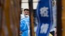 2022年6月18日，上海一个住宅社区居民接受COVID-19测试。(图片来源:：Hugo Hu/Getty Images)