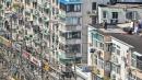 上海一个住宅小区（示意图）。(图片来源：HECTOR RETAMAL/AFP via Getty Images)