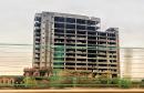 广州市广清高速旁的一栋烂尾建筑（LumHoTsing/Wikipeda/CC BY-SA 4.0）