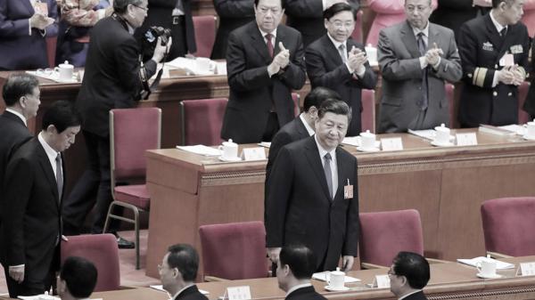 习近平在两会会场,官员们各怀心事。(Getty Images)