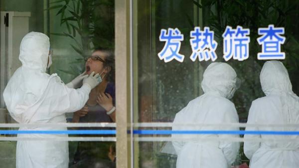 图为2009年5月在北京医院的流感检查(图片来源:Feng Li/Getty Images)