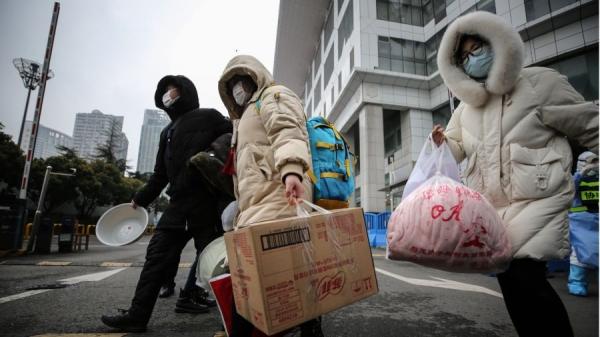 武汉肺炎患者于2020年3月9日离开武汉市的一家临时医院。(图片来源:Getty Images)