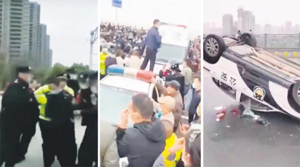 江西和湖北两地警察发生争执、扭打,引发大规模群体事件(图片来源:视频截图)