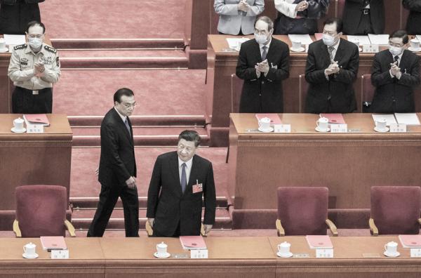 图为习近平和李克强在今年两会上。(Lintao Zhang/Getty Images)