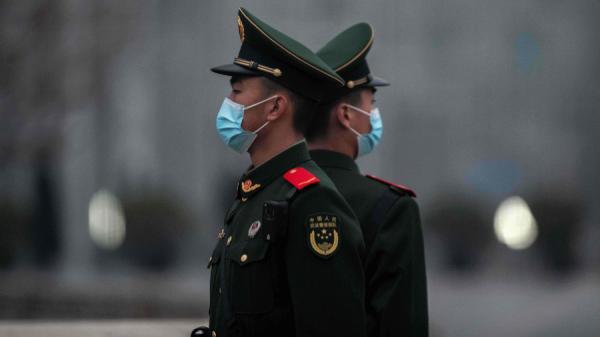 呼和浩特市近日有436名公安干警或被查处,或主动交代问题。据悉,呼和浩特共有的6055名警察,违规比例之高令人震惊。(图片来源:NICOLAS ASFOURI/AFP via Getty Images)