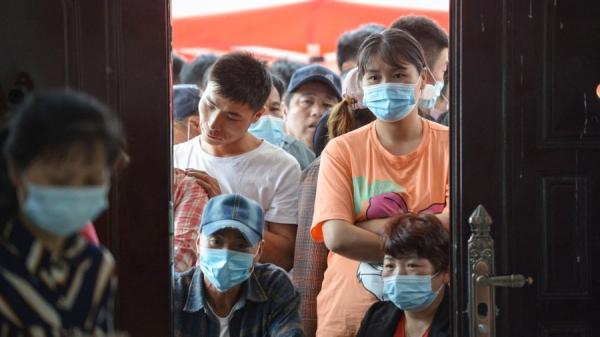 广州市宣布,启动荔湾、越秀、海珠、白云、番禺等区分级分类防控,用最短时间实现重点区域大隔离、大筛查。示意图。(图片来源:STR/AFP via Getty Images)