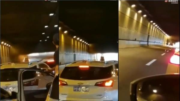 上海中环隧道一轿车起火,疑似有女子被困车内惨叫却无人施救。(图片来源:视频截图)