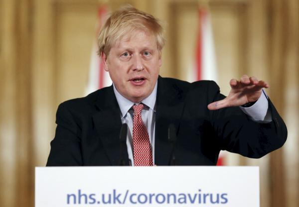 英国首相鲍里斯・约翰逊在1月19日宣布,英国防疫限制1月27日起解除。(Simon Dawson-WPA Pool/Getty Images)