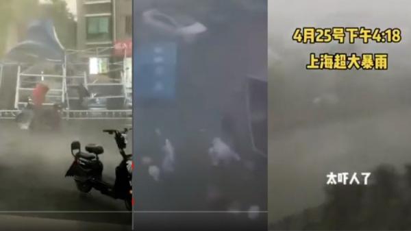 上海市迎来暴雨、狂风侵袭,不只有3名“大白”在龙卷风中倒下,当地救灾篷也瞬间“消失”。 (图片来源:视频截图)