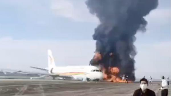 西藏航空一架空中巴士A319客机12日上午突然起火。(图片来源:视频截图)