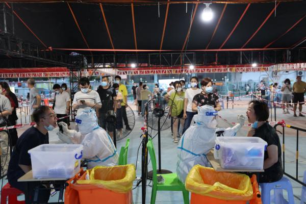 核酸检测示意图 (图片来源:STR/AFP via Getty Images)