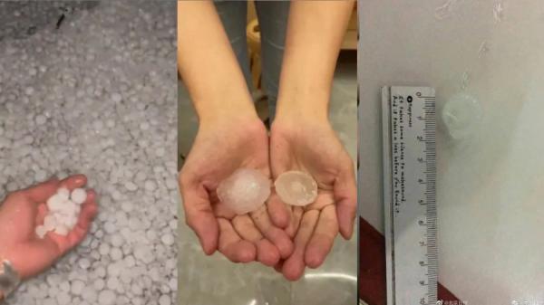 有北京市民拍到北京大雨冰雹的画面,可见冰雹直径约2厘米。(图片来源:视频截图)