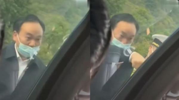 微信最近流传一段视频显示,重庆开州区副区长李先凯在劝返外地车辆时大声喝斥。(图片来源:视频截图)