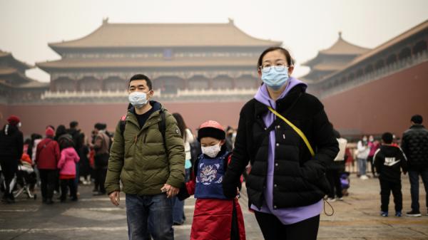 大年初二,在北京故宫门前的一家人。(图片来源:Getty Images)