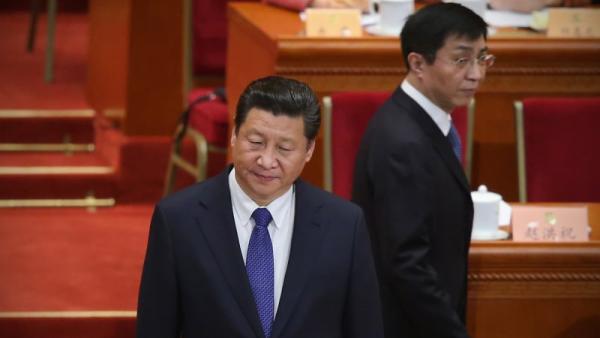 2015年3月13日,习近平(前)和王沪宁在北京大会堂。