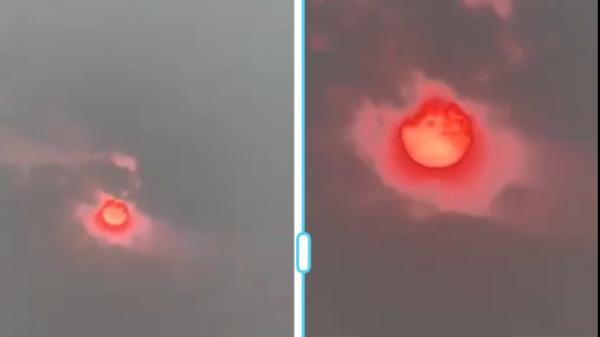 网络流传多段视频显示,黑龙江省会哈尔滨天空的太阳变成血红色。(图片来源:网络图片)