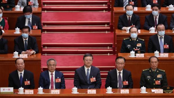 黄昆明、胡春华、陈吉宁、张国庆、何卫东出席2023年3月11日在北京举行的全国人民代表大会第四次全体会议开幕。(16:9)