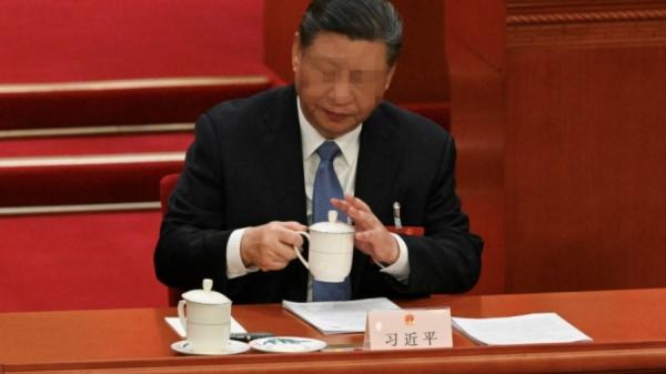 2024年3月8日，中共党魁习近平在北京人民大会堂出席全国人民代表大会第二次全体会议。（图片来源：PEDRO PARDO/AFP via Getty Images）