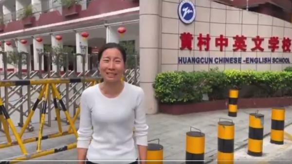 广州黄村中英文学校教师吴道云死后,其妻哭诉校方阻止家属进校。(图片来源:视频截图)