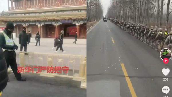 北京中南海正门黑衣人密布，传河北军人走在进京的路上。（图片来源：视频截图）