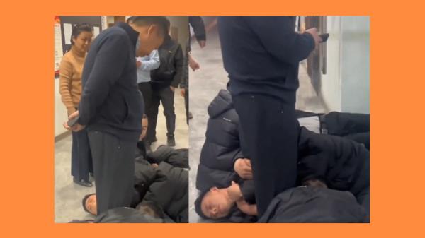 2月9日，甘肃甘南州多名农民工抱着老板的大腿讨薪。      (图片来源：视频截图)