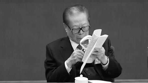 习近平为什么对江派太子党网开一面？与20多年前一桩政治交易有关。（图片来源：Lintao Zhang/Getty Images）